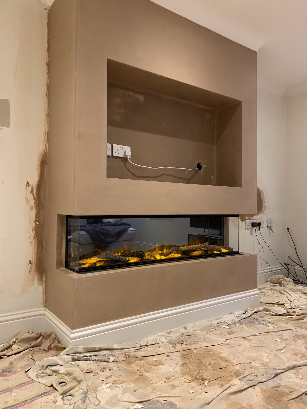 Finished media wall skimmed by Donnelly Plastering Services